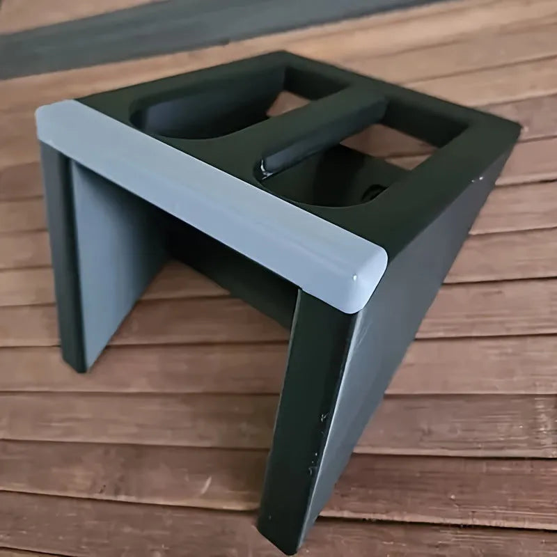 Black punk-style plastic pistol display stand for replica firearms