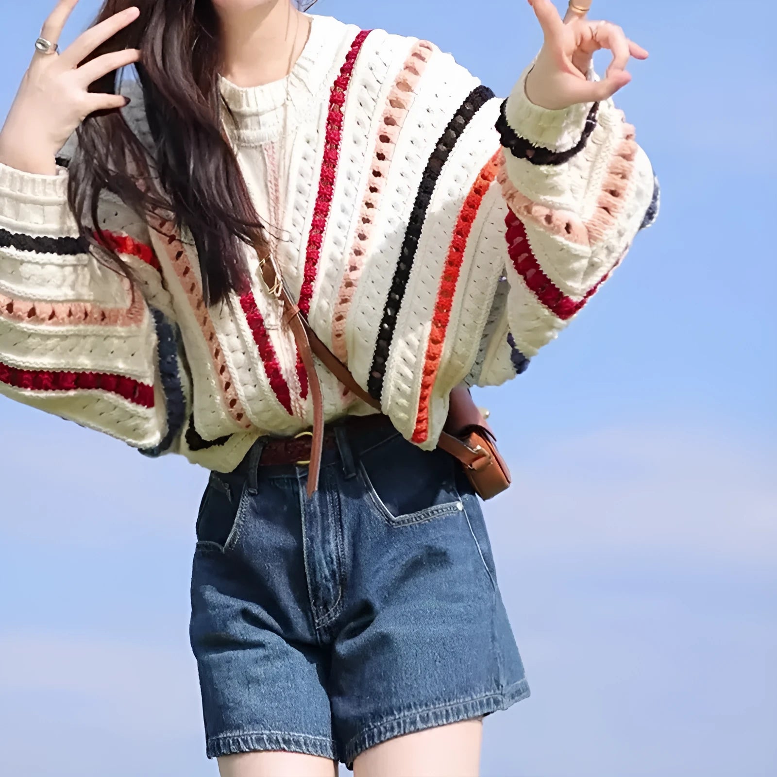 Colourful rainbow striped loose fit pullover sweater with batwing sleeves and hollow knit texture