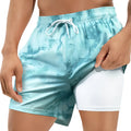 Men's loose quick-dry swimming trunks with floral pattern in green and blue colours