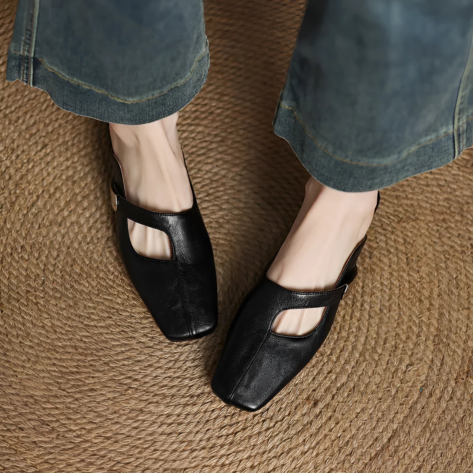 British style square head outdoor slippers in black, beige and silver colours with a low heel and rubber sole.