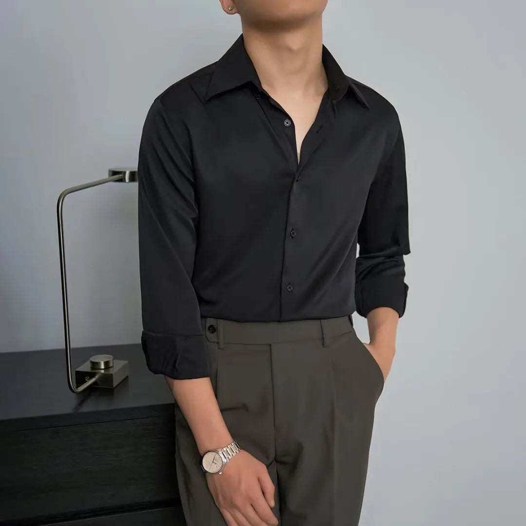 Man wearing a black long sleeve loose fit cardigan in Korean Japanese retro style
