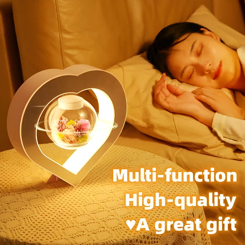 Magnetic levitation heart night light with pink eternal rose on a triangular stand