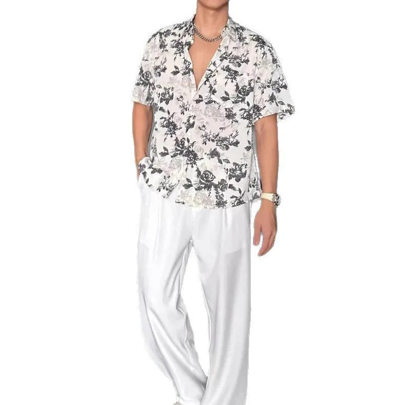 Black and white floral printed short sleeve shirt with loose fit cardigan style