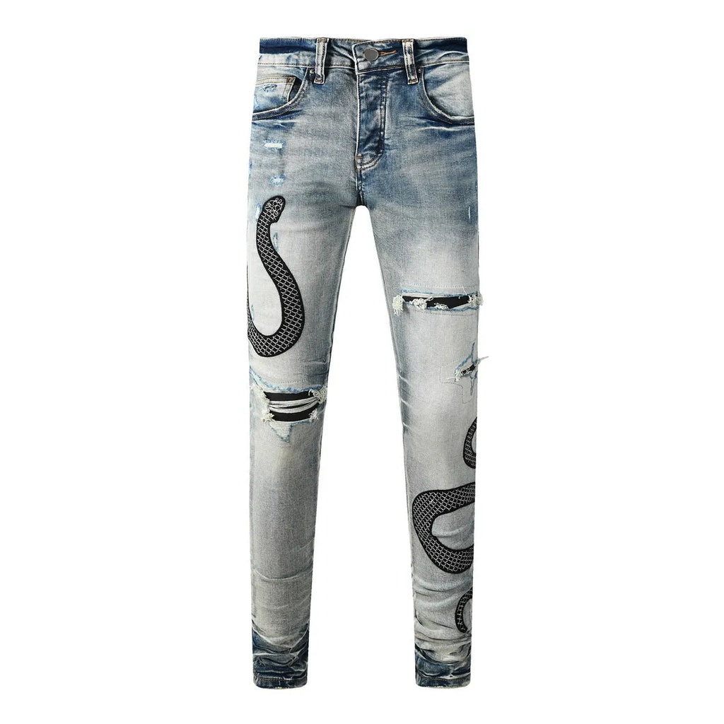 Men's distressed blue skinny jeans with a retro wash, shown with a button fly and a tight leg fit.