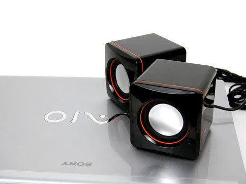 Black square USB-powered 2.0 computer speaker for desktop audio enhancement
