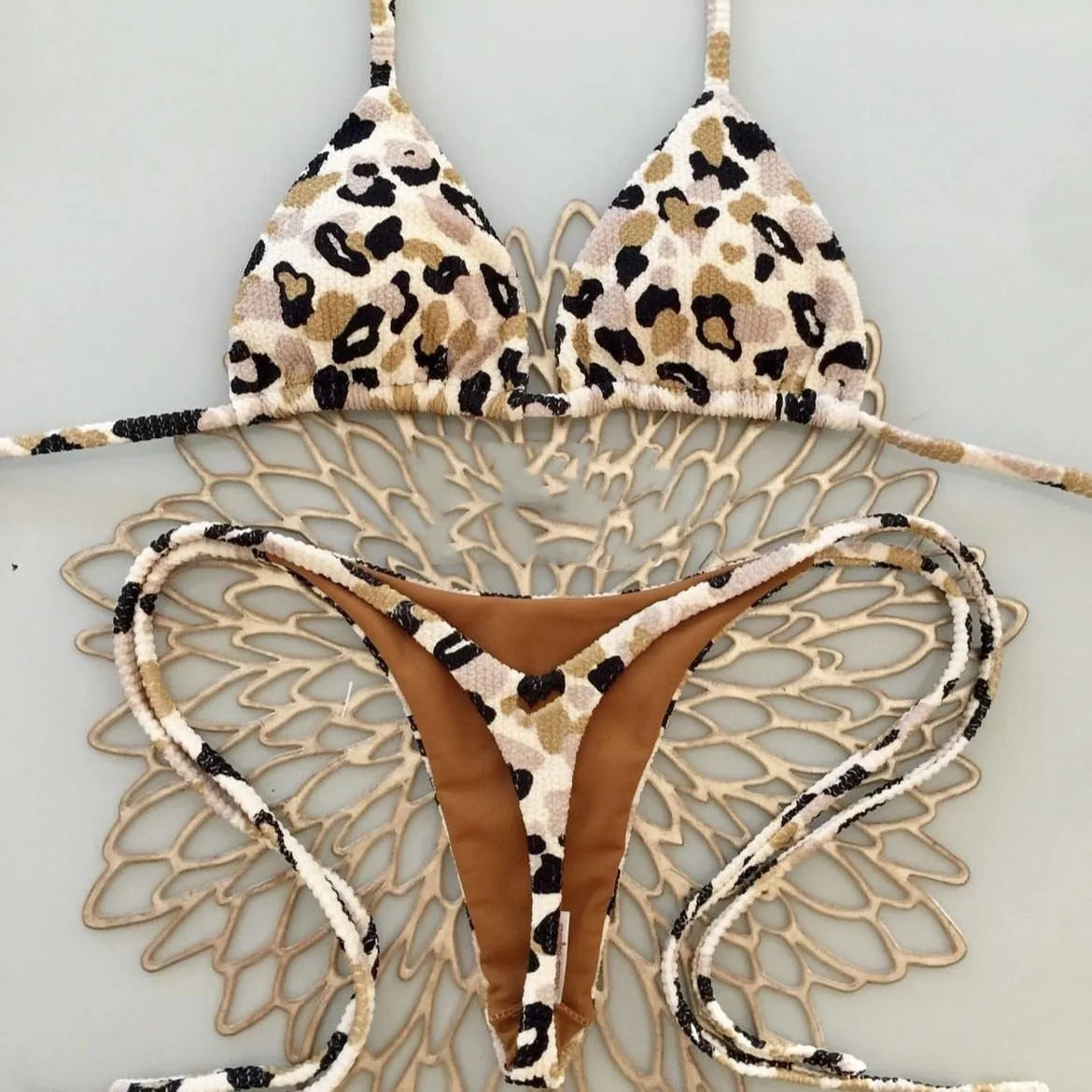 Women's printed bikini swimsuit with cotton lining in briefs style available in three colours