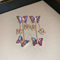 Blue purple butterfly tassel earrings with silver needle crystal flowers, approximately 8 cm drop length