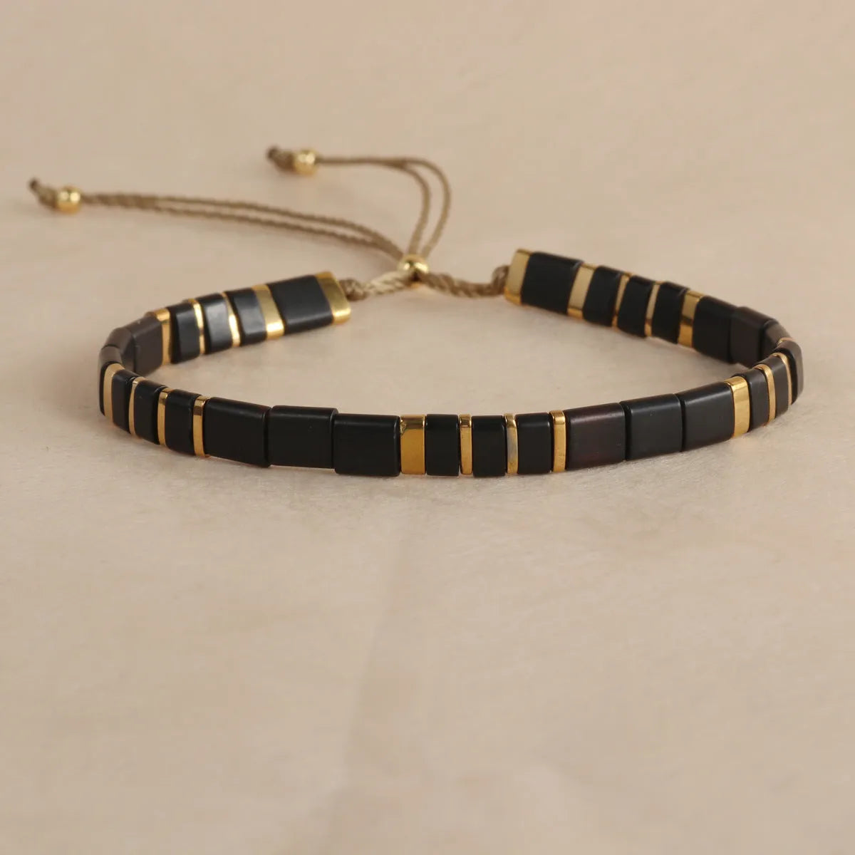 Geometric glass bead bracelet with pull adjustment in five colour options