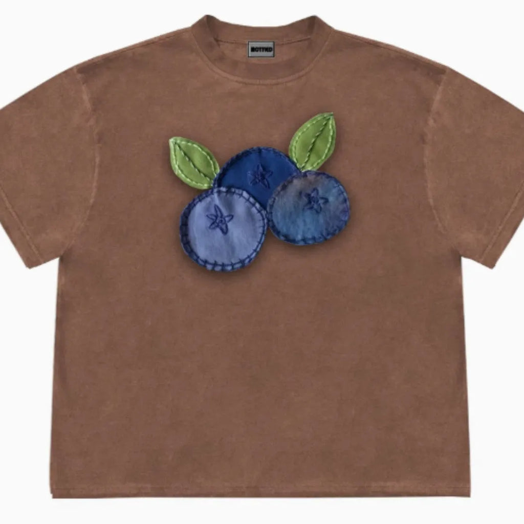 Blueberry fruit patchwork print cotton t-shirt in loose fit with short sleeves and round neck