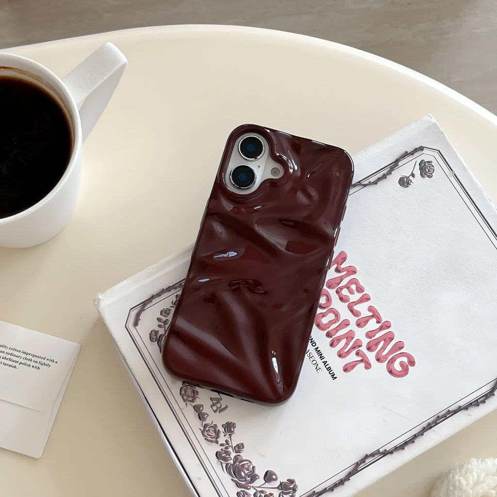 Niche irregular pleated three-dimensional TPU phone case in wine red for iPhone