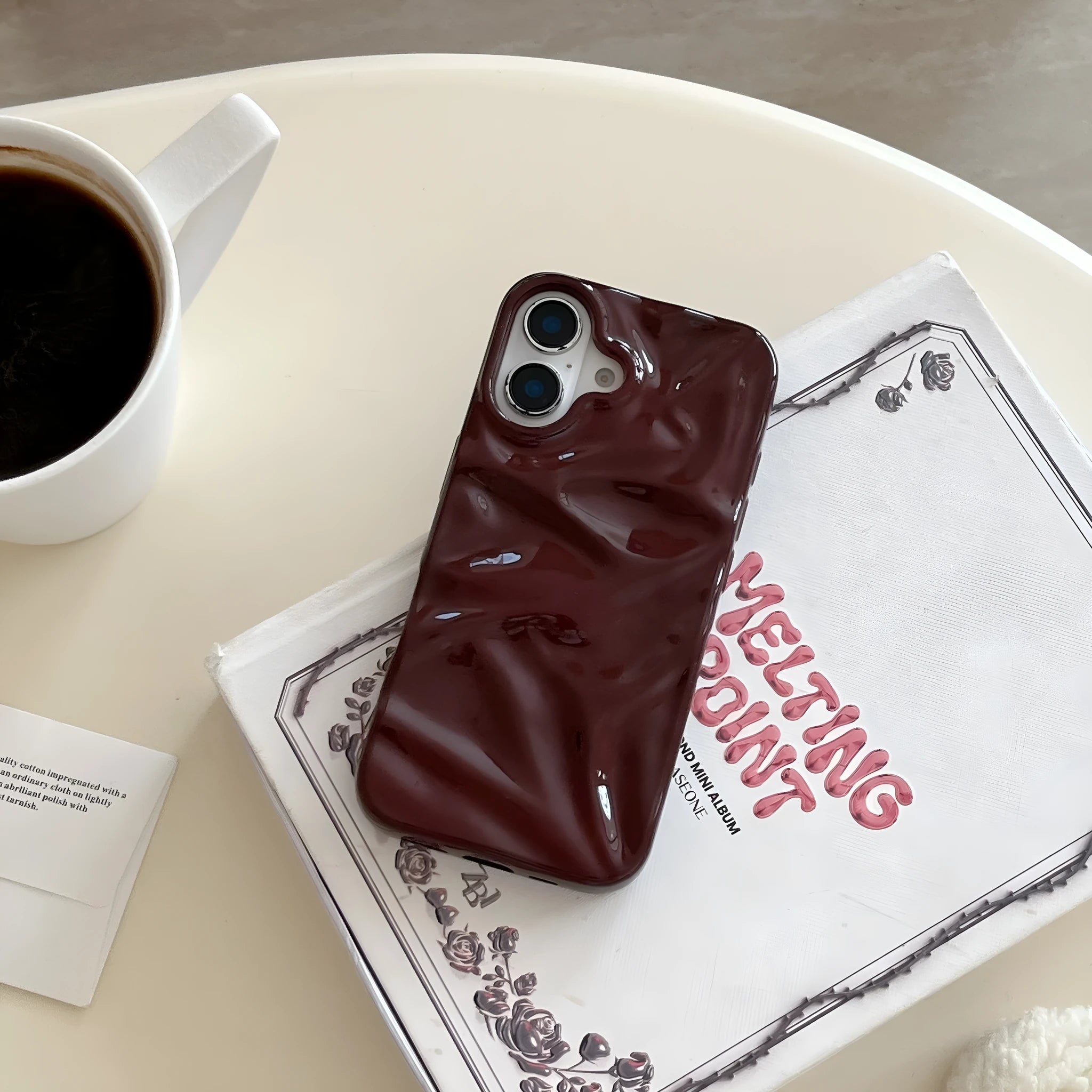 Niche irregular pleated three-dimensional TPU phone case in wine red for iPhone