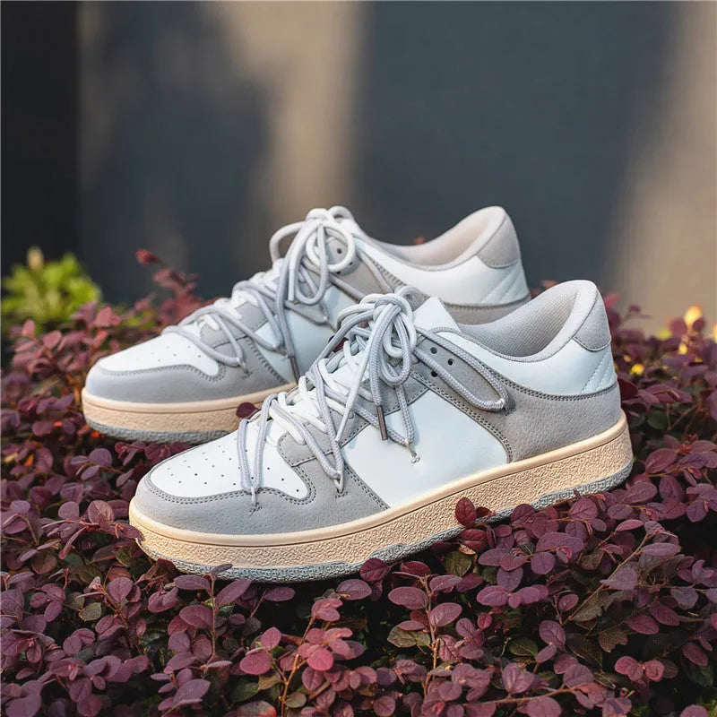 Men's low-top lace-up sneaker in beige with microfiber upper, rubber sole, and round toe design