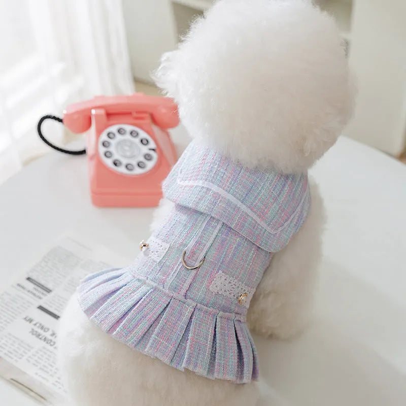 Purple and pink polyester pet clothing for cats or small dogs in sizes S, M, L, and XL.