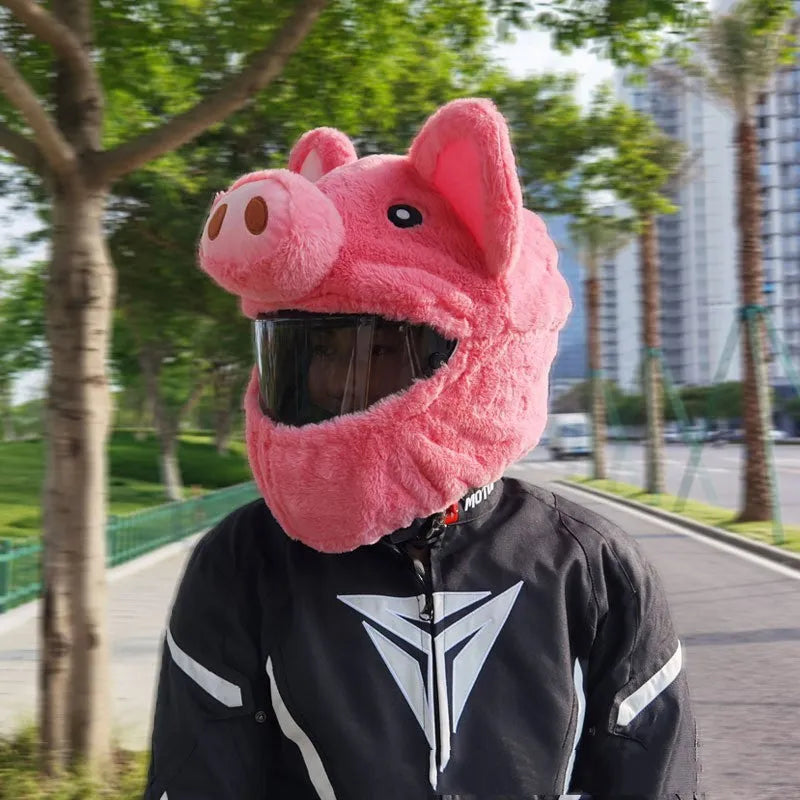 Pink pig cartoon plush helmet protective hood for motorcycle helmets with matching sleeve.