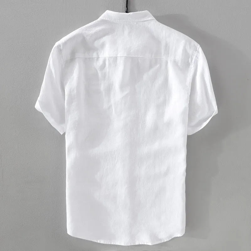 Man wearing a loose fit apricot coloured short sleeve linen cotton blend casual shirt