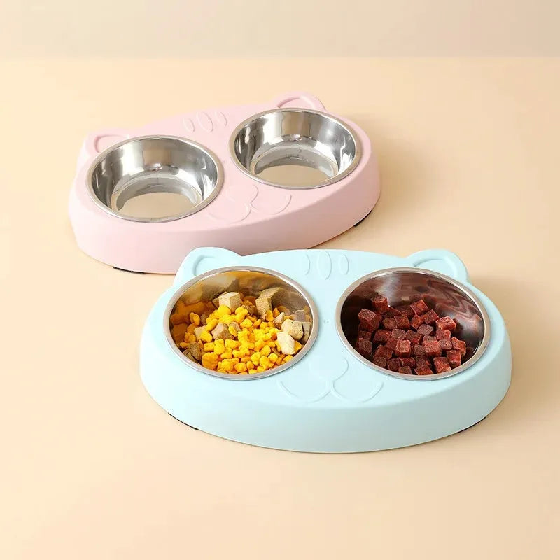 Blue macaron-shaped plastic pet feeder with two bowls for cat food and water