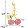 Zinc alloy cherry blossom keychain pendant in pink or red colour with three-dimensional design