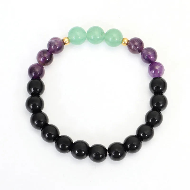 Dongling Long adjustable stone bead necklace with alloy lotus pendant and matching bracelet.