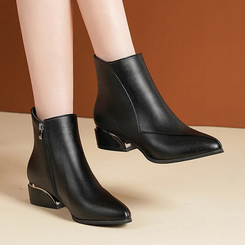 Women's chunky heel Martin boots in black with side zipper and leather stitch detail