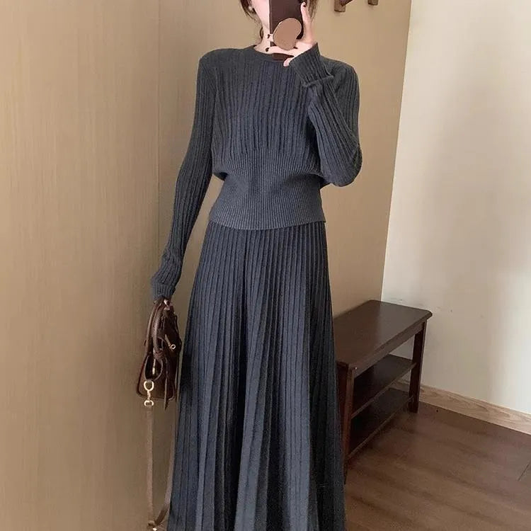 Dark grey knitted sweater and skirt suit set with artistic retro 3D pattern.