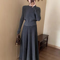 Dark grey knitted sweater and skirt suit set with artistic retro 3D pattern.