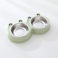 Stainless steel frog-shaped double pet bowl for food and water, available in blue, green, or pink.