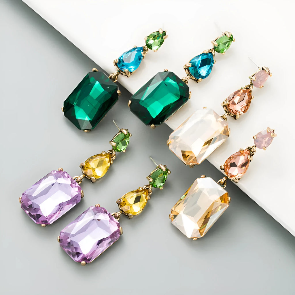 Geometric rhinestone earrings in a minimalist design with round shape, available in three colours