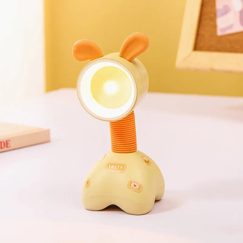 DIY cartoon magnetic small night lamp in assorted animal styles and colours on a desktop.