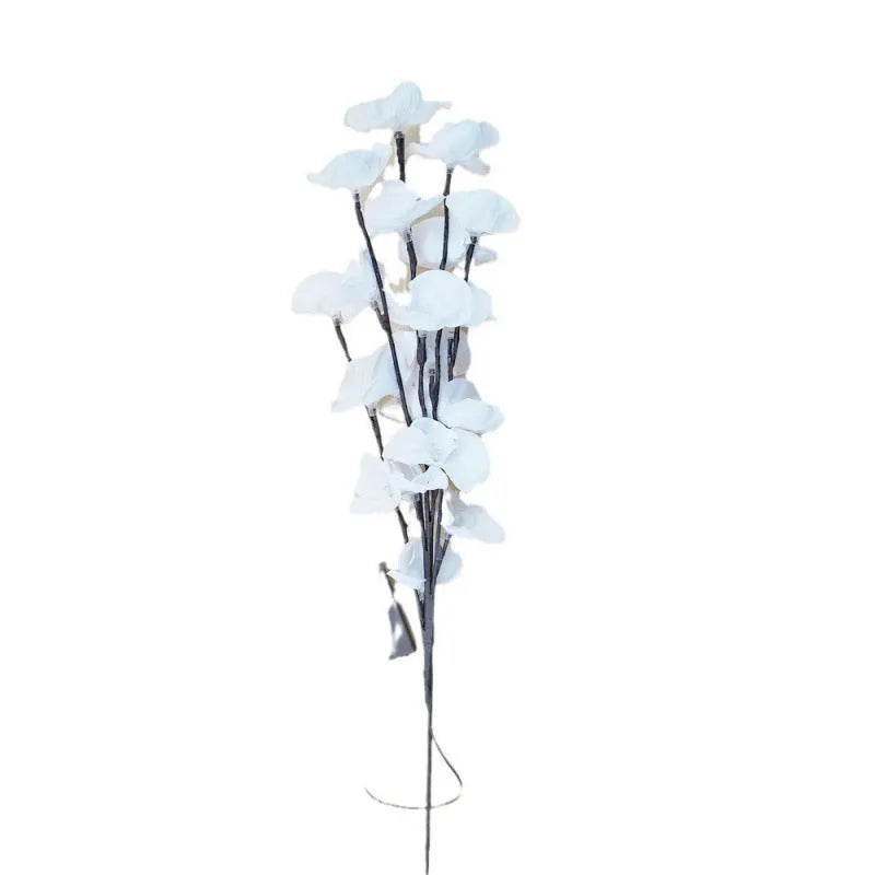 Pink LED Phalaenopsis orchid branch decorative light measuring 65cm long for bedroom walls.