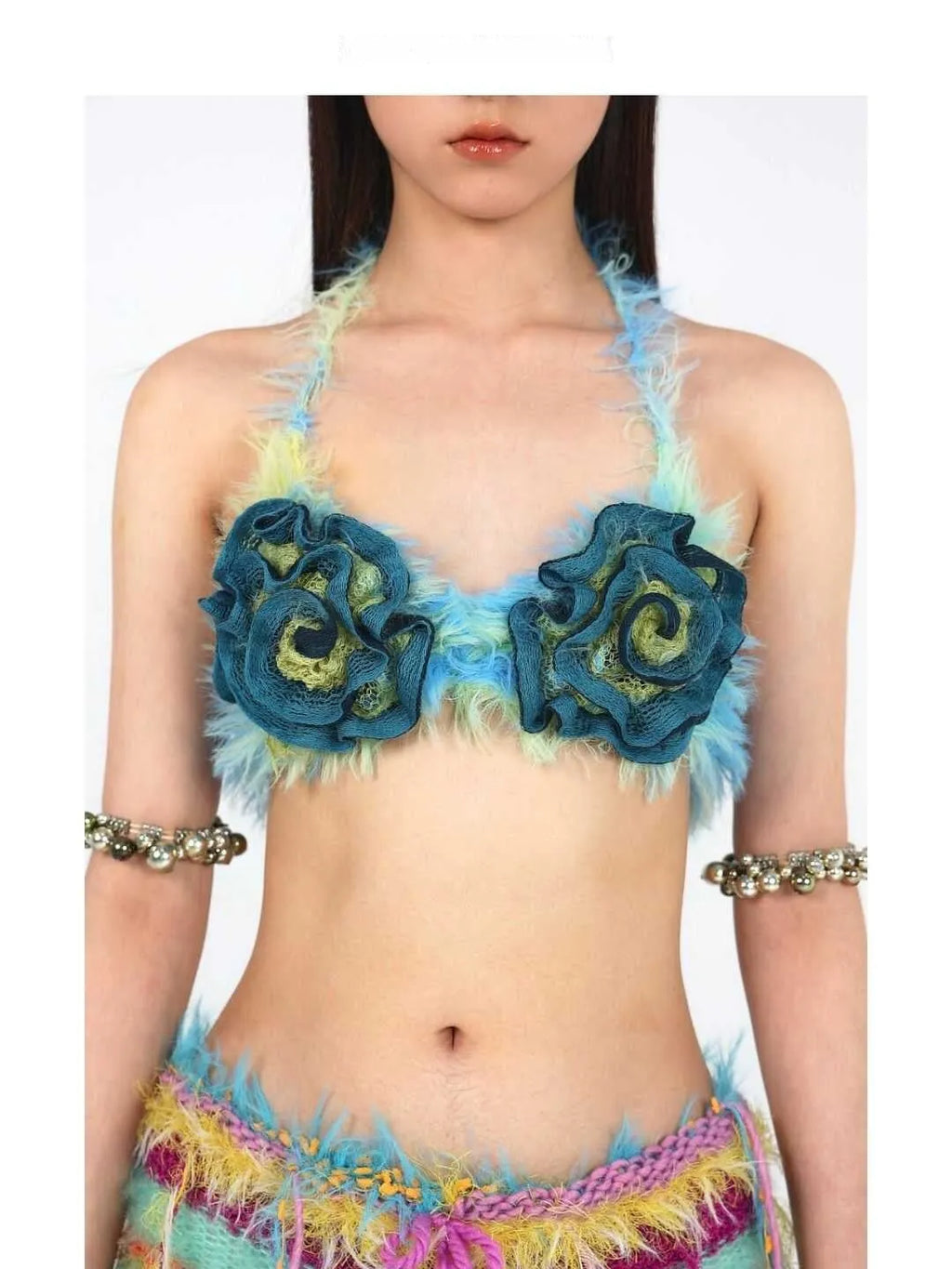 Blue floral bikini top with handmade wool knitting effect on woman model summer beachwear