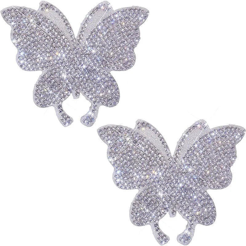 White diamond-encrusted glass car sticker with butterfly and bear claw design measuring 7x6 cm