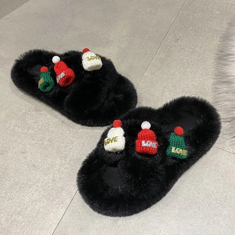 Women's Christmas hat slippers with hairy faux plush upper in black, shown from the side.
