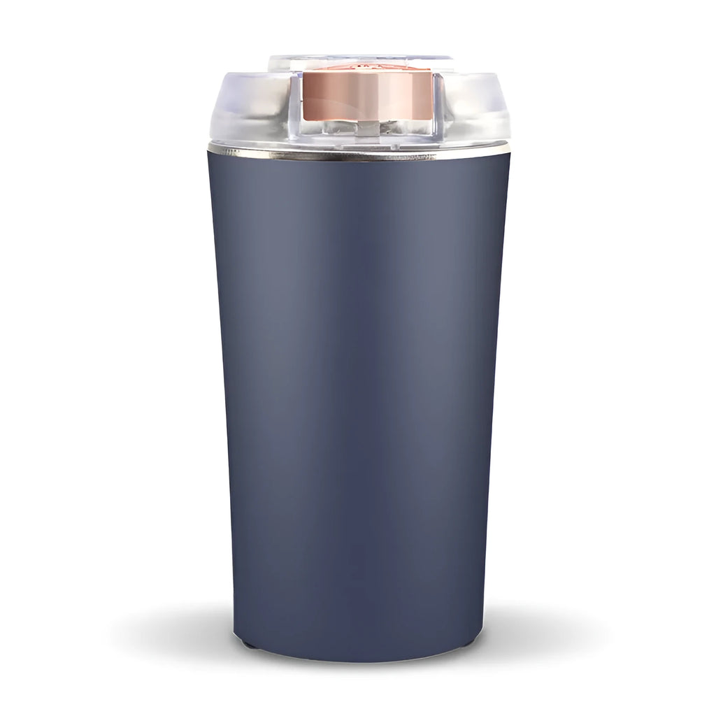 Blue manual mini flour mill and grinder for chili, pepper, and grains on a kitchen counter.