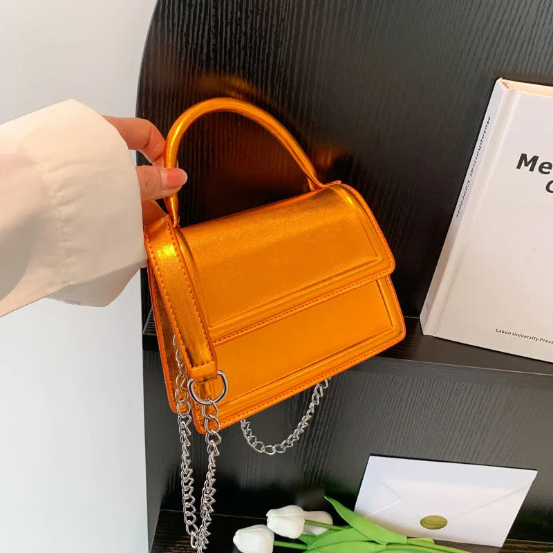 Retro style PU crossbody bag in six colour options with sewing line detailing