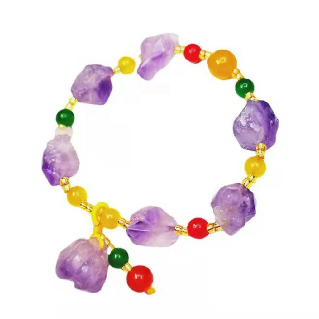Natural shaped amethyst bead bracelet with fu character element on wrist