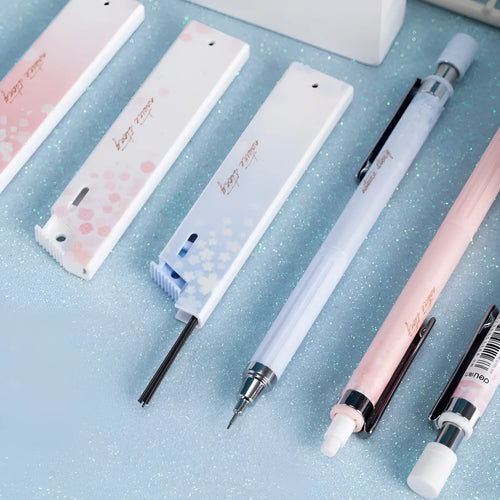 Mixed colour 0.5mm cartoon propelling pencils and HB refill boxes set on a white surface.
