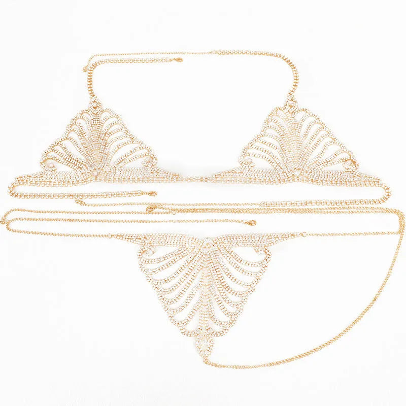 Women's gold and silver body chain set with bra and panty chains on a mannequin