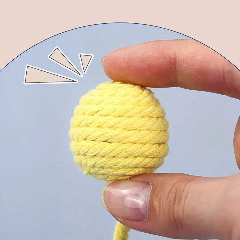 Cat toy ball with rope and bell in green pink purple yellow colours showing 3cm and 6cm size options