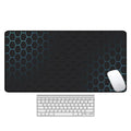 Large rectangular desk mouse pad with colourful printed pattern on natural rubber non-slip base.