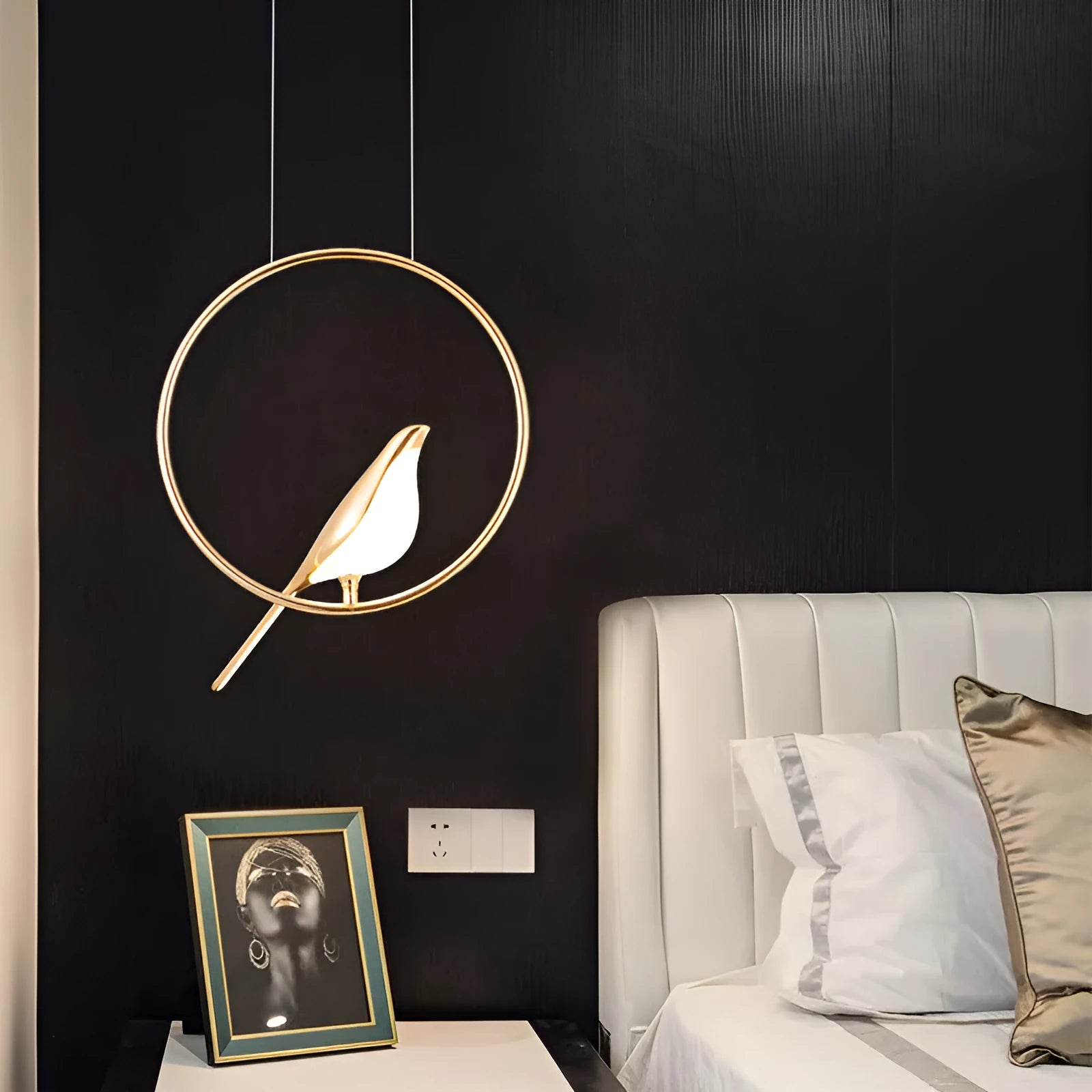 Modern minimalist magpie bird silhouette LED chandelier ceiling light made from zinc alloy and acrylic.