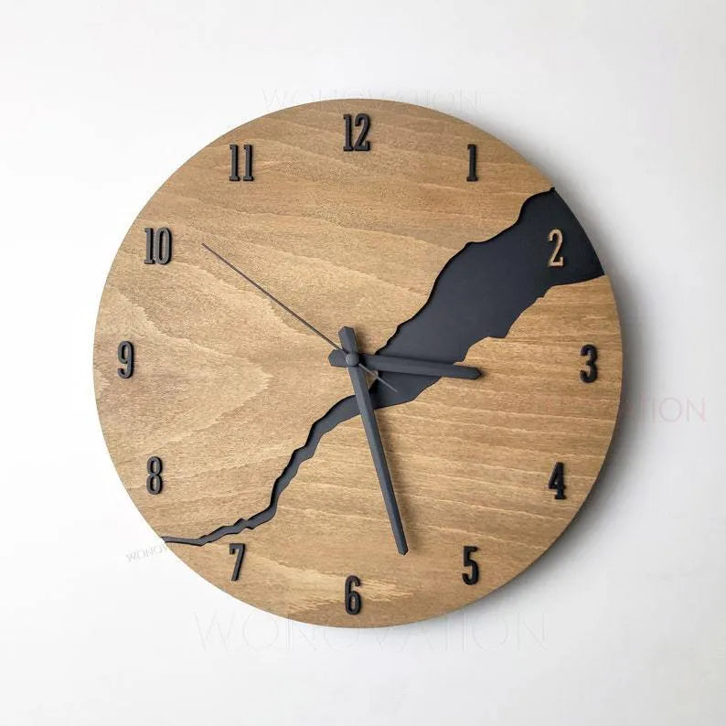 Modern round wooden wall clock with a cracked finish, 30cm in diameter.