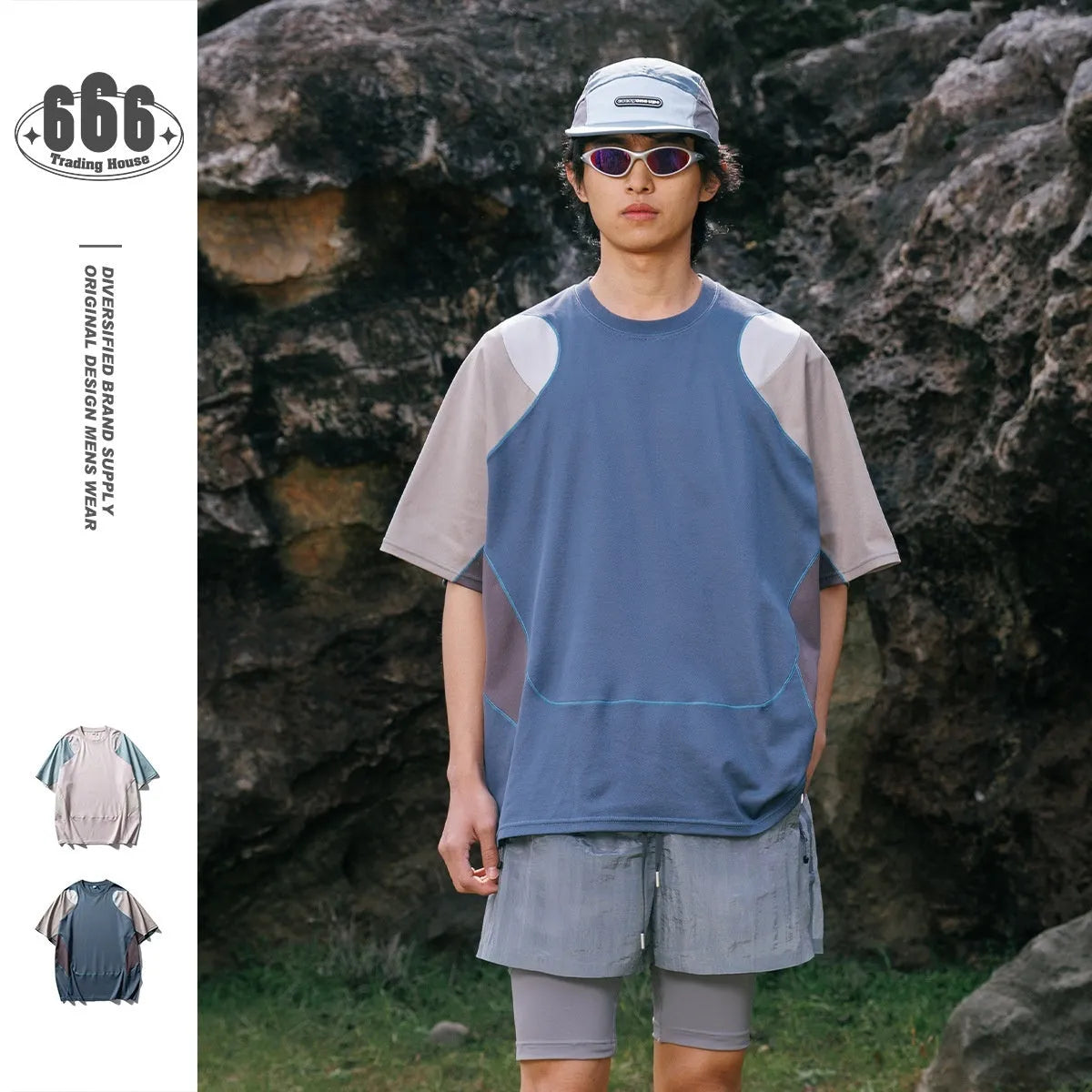 Men's loose blue patchwork short sleeve t-shirt on a hanger.