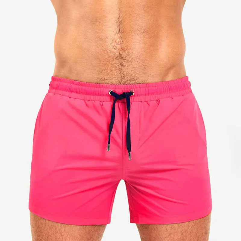 Solid colour sports shorts with mesh lining in Army Green, shown flat.