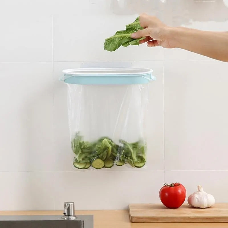 Blue plastic kitchen garbage bag storage rack mounted under a sink