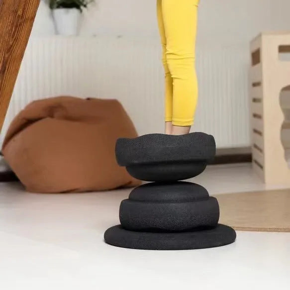 Plastic surf-style balance board with wood-grain finish for children aged 4 to 6 years.