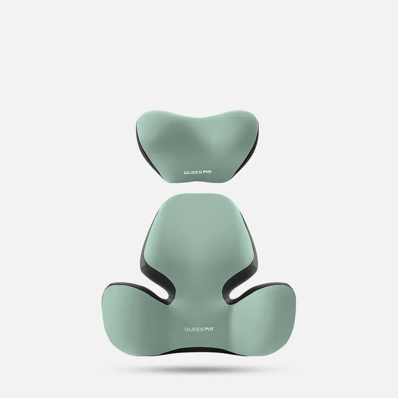 Black and grey memory foam car lumbar support pillow and matching headrest cushion on a car seat.