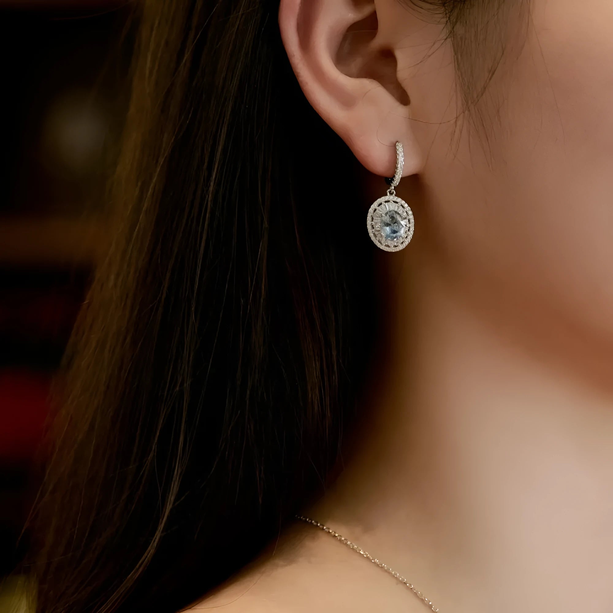 S925 pure silver aquamarine women's earrings with round and oval ring style elements on white background