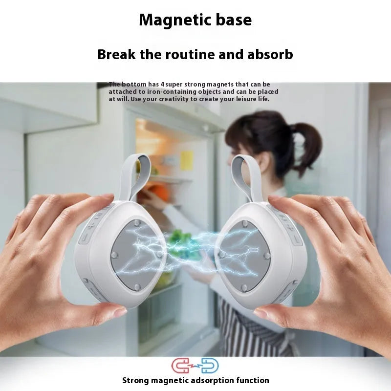 Wireless Bluetooth mini speaker with fabric waterproof cover and magnetic suction, available in black or white shell with grey or green cloth net