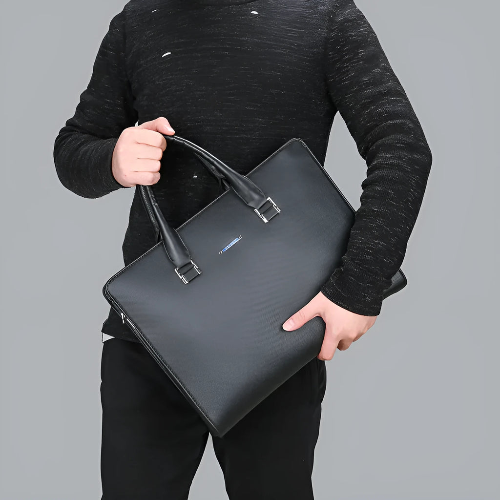 One-shoulder cross-slung male business briefcase in blue with stitching detail and soft handle