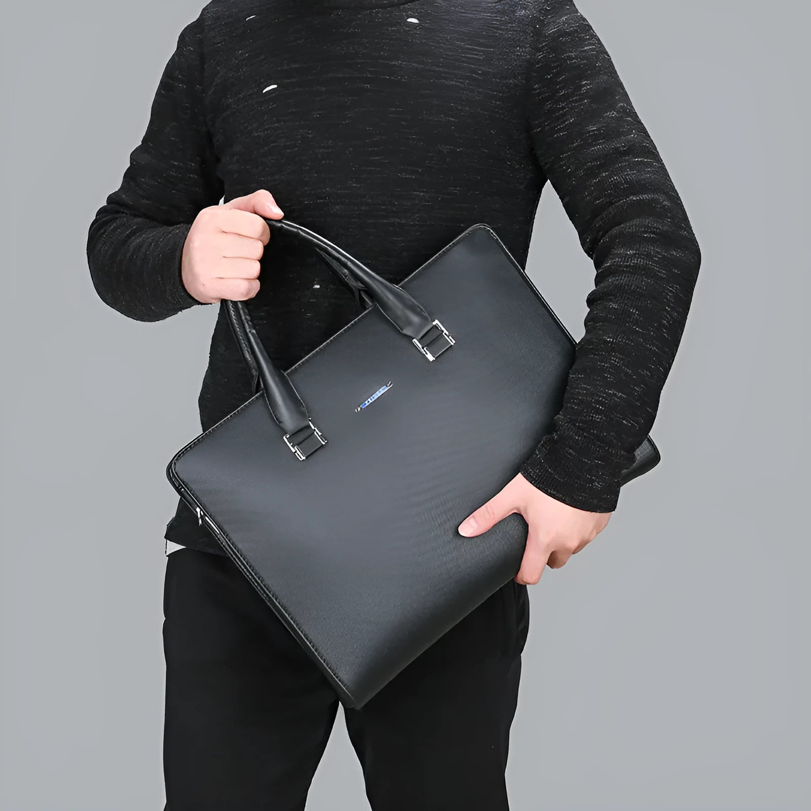 One-shoulder cross-slung male business briefcase in blue with stitching detail and soft handle